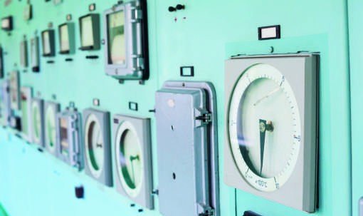 A wall of process instrumentation gauges and indicators