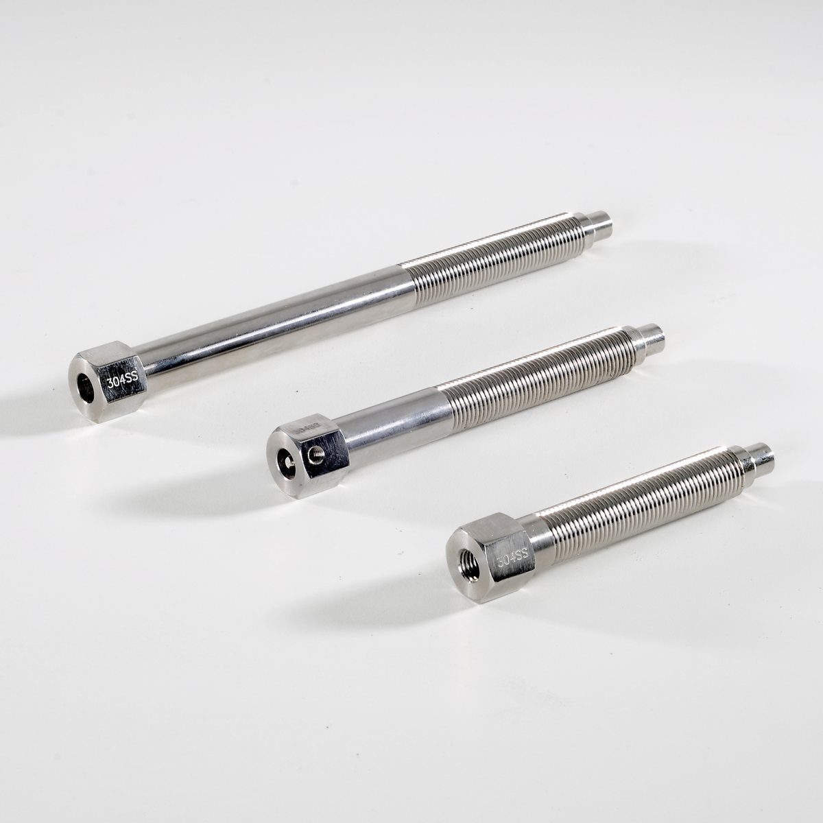 Three stainless steel meltbolts of different lengths
