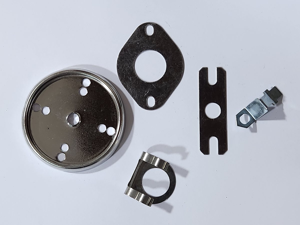 A pressed cover, gasket, clamp and bracket set
