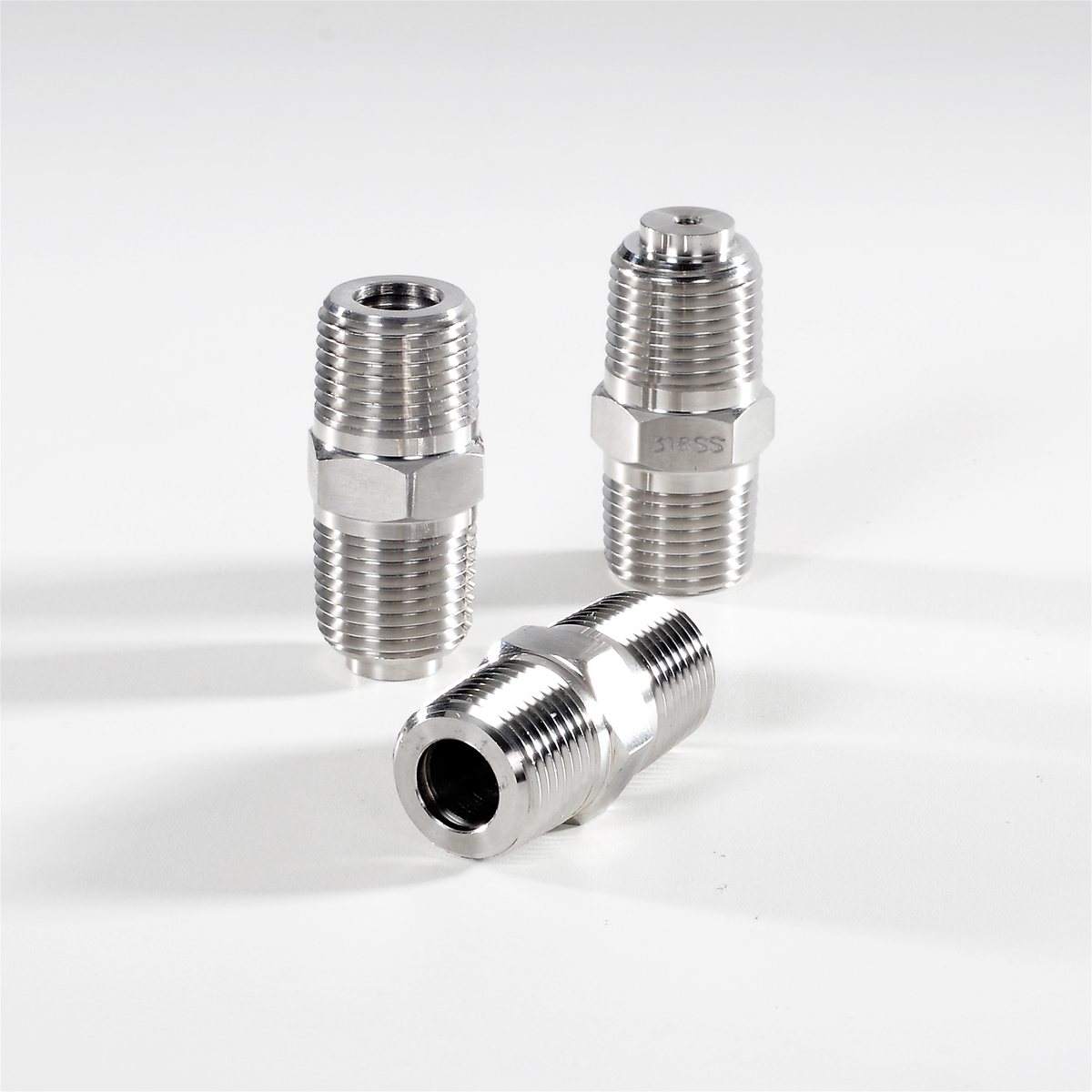 Three spring loaded hex weld fittings in stainless steel
