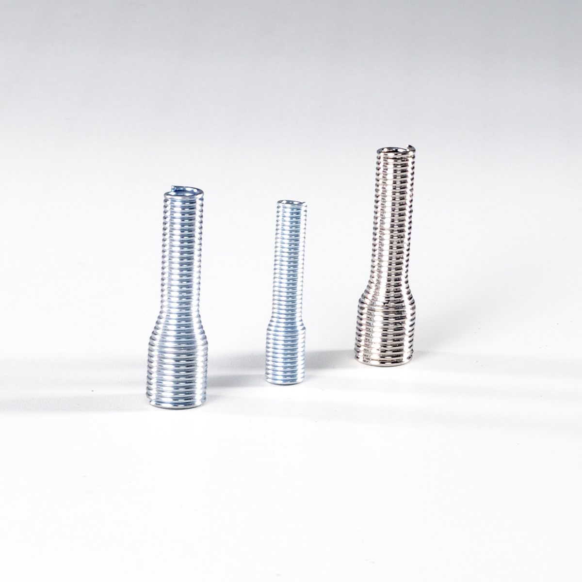Three strain relief springs over transition bodies